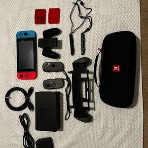 Nintendo switch with accessories & games